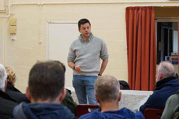 chris at a village hall