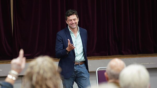 chris at a town hall